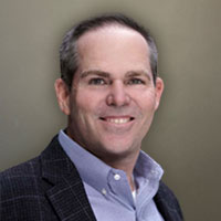 Ken Stansberger, President & CEO